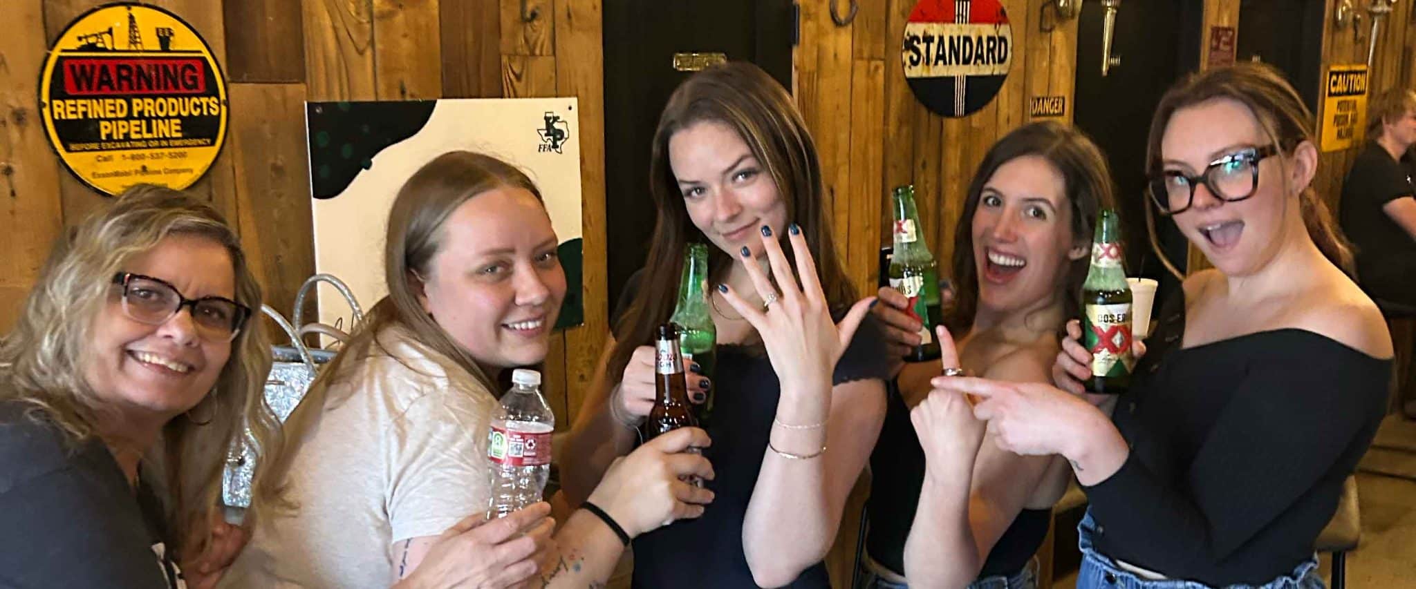 Bachelorette party group at Axe-Mania axe throwing in Kingwood, TX